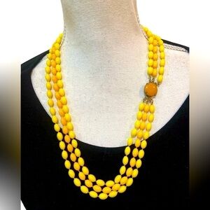 Vintage 1960’s 3 strand necklace oval beads in two tone marigold button clasp